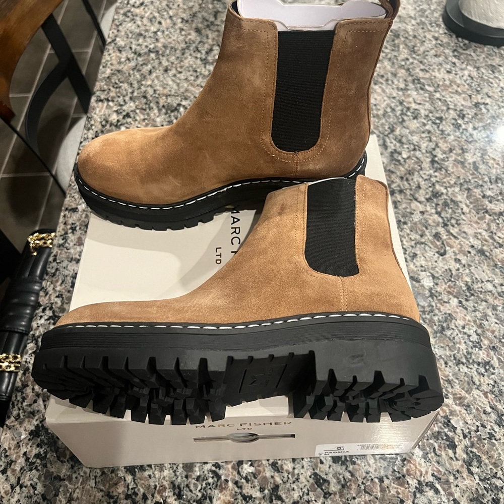 Tan suede booties.